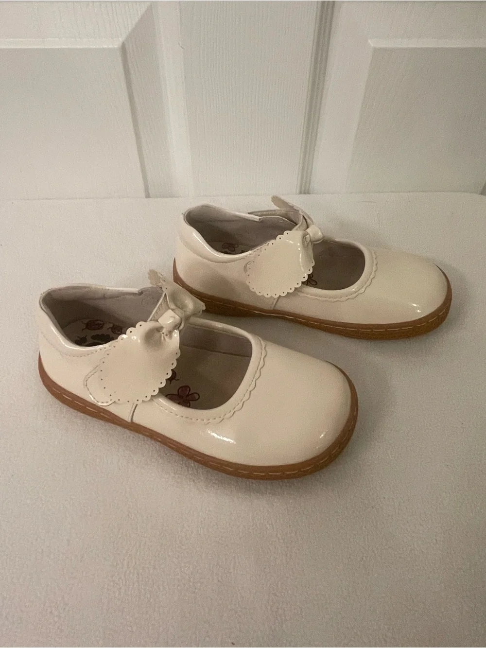 Livie & Luca Cream Patent Mary Jane Shoes with Bow Strap